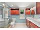 Elegant bathroom with dual vanities and a soaking tub at 507 Lakeshore Dr, Eustis, FL 32726