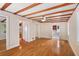 Bright bedroom with hardwood floors and ceiling fan at 507 Lakeshore Dr, Eustis, FL 32726