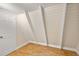 Versatile bonus room with wood flooring and a sloped ceiling at 507 Lakeshore Dr, Eustis, FL 32726