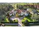 Impressive estate home with manicured landscaping and circular driveway at 15008 Pendio Dr, Bella Collina, FL 34756