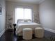 Bright bedroom with queen-size bed and plenty of storage at 15008 Pendio Dr, Bella Collina, FL 34756