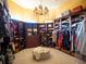 Spacious walk-in closet with ample shelving and hanging space at 15008 Pendio Dr, Bella Collina, FL 34756