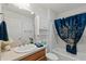 Clean bathroom with shower/tub combo and vanity at 736 Jones Ln, The Villages, FL 32163