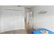 Bedroom with twin bed and access to hallway at 736 Jones Ln, The Villages, FL 32163