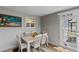 Sunroom dining area with access to outdoors at 736 Jones Ln, The Villages, FL 32163
