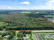 Large wooded lot with road frontage, ideal for development at 3448 Cr 567, Center Hill, FL 33514