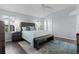 Main bedroom with wood flooring and ceiling fan at 3401 Fairfield St, The Villages, FL 32162