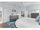Bedroom with dresser and view into living room at 3401 Fairfield St, The Villages, FL 32162