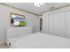 Bedroom with white dresser and built-in closet at 3401 Fairfield St, The Villages, FL 32162