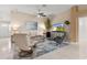 Living room with comfortable seating and a large TV at 3401 Fairfield St, The Villages, FL 32162