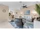 Spacious living room with comfortable seating and large TV at 3401 Fairfield St, The Villages, FL 32162