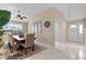 Spacious dining area with wood table and neutral chairs at 3401 Fairfield St, The Villages, FL 32162