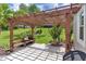 Relaxing pergola and patio area at 5515 Citation Ct, Lady Lake, FL 32159