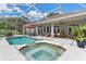 Relaxing pool and spa with screened enclosure at 5515 Citation Ct, Lady Lake, FL 32159