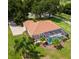 House with pool and lush landscaping at 5515 Citation Ct, Lady Lake, FL 32159