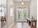 Bright and airy entryway with stained glass doors at 5515 Citation Ct, Lady Lake, FL 32159
