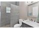 Clean bathroom with a walk-in shower, toilet and vanity at 5515 Citation Ct, Lady Lake, FL 32159