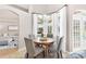 Bright breakfast nook with a charming round table and access to the backyard at 5515 Citation Ct, Lady Lake, FL 32159