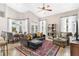 Relaxing living room with a leather sectional sofa and a large TV at 5515 Citation Ct, Lady Lake, FL 32159