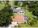 Two homes, one with a pool, overlooking a golf course at 5515 Citation Ct, Lady Lake, FL 32159