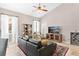Comfortable living room showcasing a sectional sofa and built-in shelving at 5515 Citation Ct, Lady Lake, FL 32159