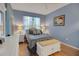 Spacious bedroom with wood floors and a ceiling fan at 32915 Crooked Oaks Ln, Leesburg, FL 34748