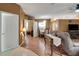 Spacious entryway with wood floors and views into the living and dining areas at 32915 Crooked Oaks Ln, Leesburg, FL 34748