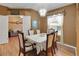 Elegant dining room with a formal table and chairs at 32915 Crooked Oaks Ln, Leesburg, FL 34748