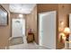 Entryway with tile floor, chandelier, and furniture at 32915 Crooked Oaks Ln, Leesburg, FL 34748