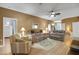 Relaxing living room with comfortable seating and hardwood floors at 32915 Crooked Oaks Ln, Leesburg, FL 34748