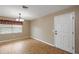 Spacious dining room with tile floors and a view to the kitchen at 11712 Layton St, Leesburg, FL 34788