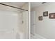 Bathroom with a shower stall and built-in shelving at 1438 Silver Cove Dr, Clermont, FL 34714