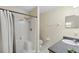 Bathroom with shower stall and single sink vanity at 1438 Silver Cove Dr, Clermont, FL 34714