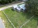 House and yard viewed from above at 19402 E 5Th St, Umatilla, FL 32784