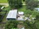 Aerial view of a detached workshop and recreational vehicle at 19402 E 5Th St, Umatilla, FL 32784