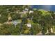 Aerial view of property highlighting lot size near the lake at 10367 Se Sunset Harbor Rd, Summerfield, FL 34491