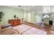 Open concept living room with view to kitchen at 10367 Se Sunset Harbor Rd, Summerfield, FL 34491