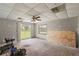 Spare bedroom with ceiling fan, large sliding door to backyard at 10367 Se Sunset Harbor Rd, Summerfield, FL 34491