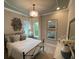 Charming bedroom with a metal bed frame and window at 10068 Fiddley Aly, Orlando, FL 32827