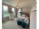 Bright bedroom with floral bedding and modern decor at 10068 Fiddley Aly, Orlando, FL 32827