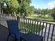 Relaxing porch view overlooking a park-like setting with lush greenery at 124 Orange Ave, Clermont, FL 34711