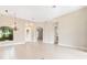 Open dining area with tile floors and a chandelier at 39644 Harbor Hills Blvd, Lady Lake, FL 32159