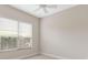 Bright bedroom with a large window and ceiling fan at 39644 Harbor Hills Blvd, Lady Lake, FL 32159