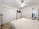 Spacious bedroom with a queen bed and ample closet space at 4706 Glen Coe St, Leesburg, FL 34748