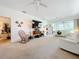 Living room with hardwood floors, and plenty of natural light at 4706 Glen Coe St, Leesburg, FL 34748