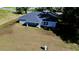 Aerial view of house from backyard, showing new landscaping at 5 Malauka Radial Run Rd, Ocklawaha, FL 32179