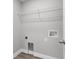 Laundry room with wire shelving and built-in storage at 5 Malauka Radial Run Rd, Ocklawaha, FL 32179