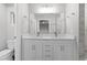 Bathroom with double vanity and walk-in shower at 5 Malauka Radial Run Rd, Ocklawaha, FL 32179