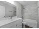 Clean bathroom with white vanity, quartz countertop, and shower/tub combo at 5 Malauka Radial Run Rd, Ocklawaha, FL 32179