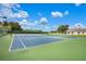 Community tennis courts on a sunny day at 5008 Greenbriar Trl, Mount Dora, FL 32757